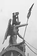 A camera operator atop Brandenburg Gate (1926)