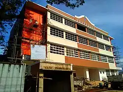 (from top clockwise) Executive & Legislative Building, Municipal Hall, Immaculate Conception Parish, Burauen Health and Wellness Center, Daguitan River & NIA Irrigation Facility and Tourism Office.