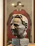 Plaster bust of Edmund Blunden by KY Wong, early 1960s now at Merton College Library