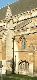 A buttress and a flying buttress, mostly concealed, supporting walls at the Palace of Westminster
