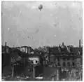Balloon of Henri Giffard over Paris rooftops, 1878.[8][9]