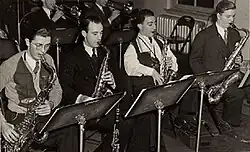 Don Raffell on far right in the Charlie Spivak sax section, 1941