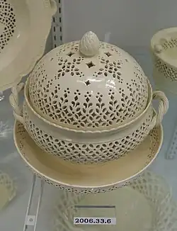 Chestnut basket on dish, attributed to Leeds Pottery, 1780-1800, creamware. Hot roast chestnuts needed to be able to "breathe".[16]