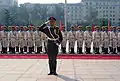 Sailors in the battalion as well as the commander stand at attention during US Secretary of Defense Donald H. Rumsfeld's visit to Beijing, October 2005.