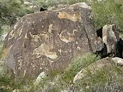 Chipping petroglyph on the White Tank Mountain Regional Park Waterfall Trail, Arizona