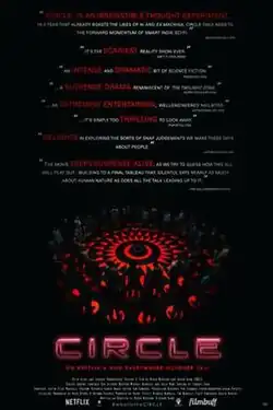 The cover of the film. There are several reviews at the top. Below them, a large group of people stand in a circle in the dark. There are red markings on the floor. Below the image is the title of the movie (Circle) and the caption, "On Netflix & Vod everywhere October 16th".