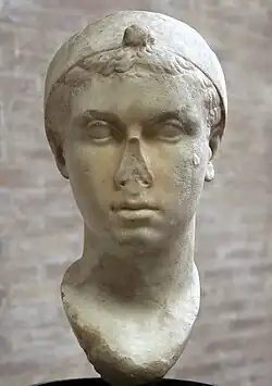 Cleopatra, mid-1st century BC, with a "melon" hairstyle and Hellenistic royal diadem worn over her head, now in the Vatican Museums[1][3][433]