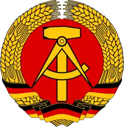 A compass on the former National Emblem of East Germany (former German Democratic Republic).