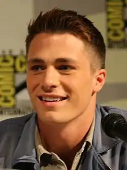 Crew cut: top, long; back/sides, semi-short taper; sideburns, short; short pomp (pompadour) front, arched; mid top, rounded; crown, rounded; front hairline, average; wavy hair. Colton Haynes.