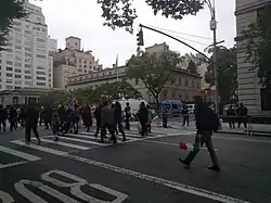 The Frick House as seen from Fifth Avenue and 70th Street during a Columbus Day parade