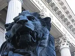 Detail of one of the two bronze lions outside the Spanish Congress of Deputies building, in Madrid