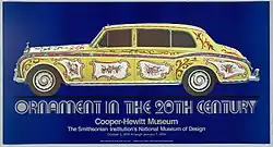 Blue poster with psychedelic paint job on Rolls-Royce Phantom V automobile.