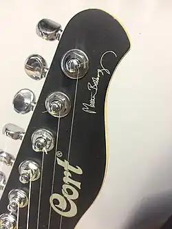 Headstock in front with signature