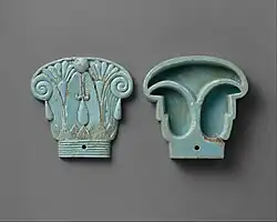 Cosmetic box in the shape of an Egyptian composite capital, its cap being in the left side; 664–300 BC; glassy faience; 8.5 × 9 cm; Metropolitan Museum of Art
