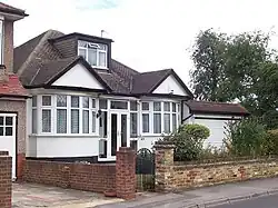 A semi-detached mock Tudor residential premises