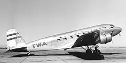TWA DC-2 airplane parked on airport's concrete apron