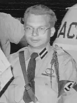 Black and white photo of Burros wearing Nazi garb and an armband