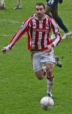 Danny Higginbotham playing for Stoke City