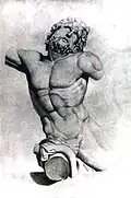 Monochrome sketch of a sculpture of a bearded nude man. The sculpture's right extremities and left arm are truncated, its left thigh fades out of the image frame. A serpentine shape covers the figure's pubic area and right thigh. The man's body faces the looker and his gaze stars up.