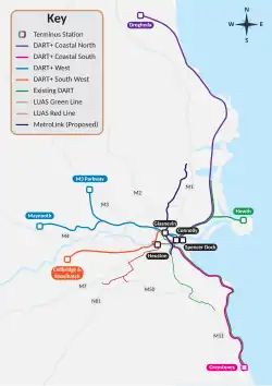 Map of the Dublin area with existing DART and LUAS services (2023), the proposed DART+ programme, and the proposed MetroLink. Terminus stations at Heuston, Connolly, Spencer Dock, and Glasnevin are shown.