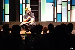 Brent on a theatre stage