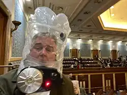 A selfie of David Trone wearing a gas mask while evacuating the House gallery during the January 6 United States Capitol attack
