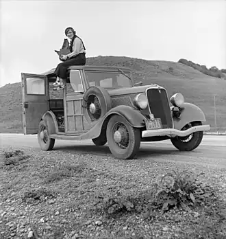 Dorothea Lange on a 1933 Model 40 (V-8) station wagon. The B is similar; the only outside differences are lack of the V-8 emblem on grille and hub caps. Considered a commercial car, it came in standard guise only.