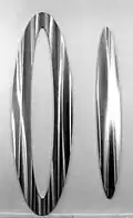 Double Ellipse of Full and Empty Form, 1997, aluminum, dimensions: 3300 × 975 × 38 mm/180 kg. 2780 × 367 × 38 mm/120 kg, collection: Museum of Contemporary Art, Belgrade, Serbia