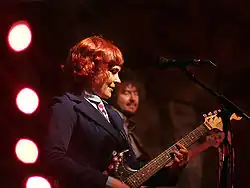 Ealom playing guitar