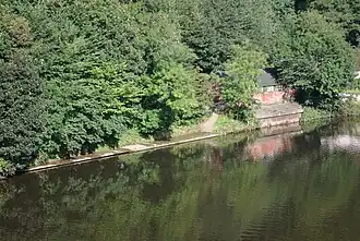 Durham School Boat Club's boathouse seen from Prebends Bridge, United Kingdom