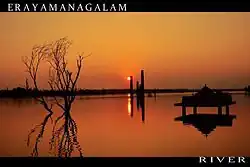 A sunset view over a wide river