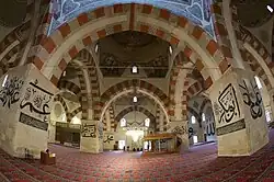 Interior of the mosque, looking from the entrance towards the mihrab