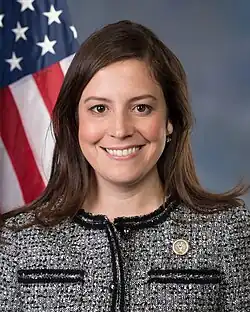 Official portrait of Elise Stefanik. She is a middle-aged woman with dark hair.