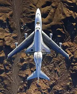 STS-126 The Space Shuttle Endeavour mounted atop its modified Boeing 747 carrier aircraft flies over California's Mojave Desert on its way back to the Kennedy Space Center in Florida on December 10, 2008.