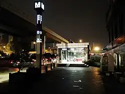 Entrance D of Zongguan station (outside, at night)