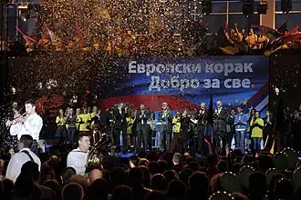 Democratic Party officials celebrating Serbia receiving candidate status for European Union membership