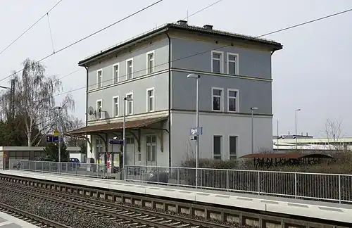 Three-story building with hip roof