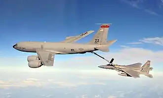 A F-15C Eagle is refueled by a KC-135R Stratotanker, both aircraft are from the 18th Wing based at Kadena Air Base, Japan.