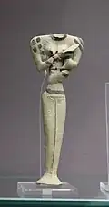 Figurine of a woman feeding a child and decorated to show jewellery or tattoos; clay; c. 5200 – c. 4200 BC; Tell el-Muqayyar