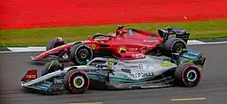 Leclerc racing against Lewis Hamilton at the 2022 British Grand Prix