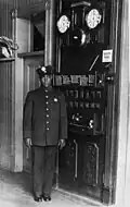 Fireman Lawrence Washington stands inside Engine Company No. 30 of the Los Angeles Fire Department, 1913