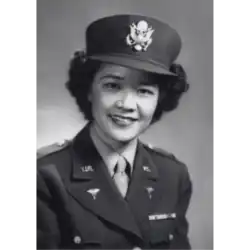Black-and-white head shot of Seetoo in uniform and smiling