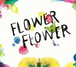 The words "Flower Flower" in black on a white background, surrounded by splotches of colors.