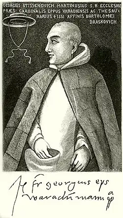 A half-bald middle-aged man wearing a coat