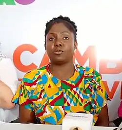 Francia is talking in a campaign activity.