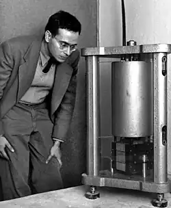 Press looking at a machine