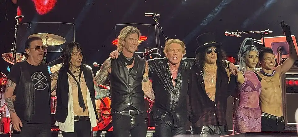 Guns N' Roses at Usce Park, Belgrade in 2025. From left to right: Dizzy Reed, Richard Fortus, Duff McKagan, Axl Rose, Slash, Melissa Reese and Isaac Carpenter.