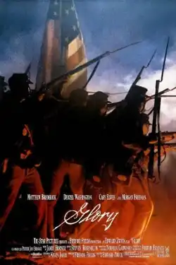 A group of Union soldiers with Rifles and American Flag charging into battle with the film's title "Glory" and credits at the bottom.