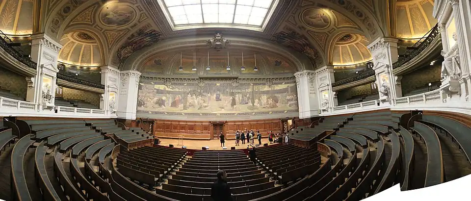 Panorama of the Grand Amphitheater, decorated with murals of the history of the university.