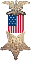 The Grand Army of the Republic badge. Authorized by the U.S. Congress to be worn on the uniform by Union Army veterans.